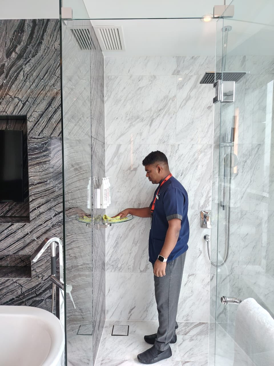 T&M housekeeping staff preparing hotel linens